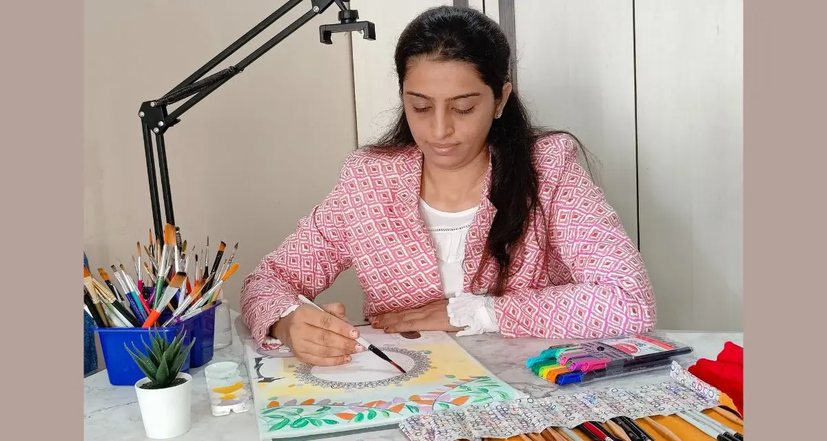 Jigisha, artist of mypaintingstories, drawing a mandala artwork with sketch pens and brushes